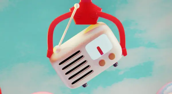 Ein roter Greifarm hebt ein Retro-Radio hoch. Vielleicht spielt es den meist gecoverten Song aller Zeiten.